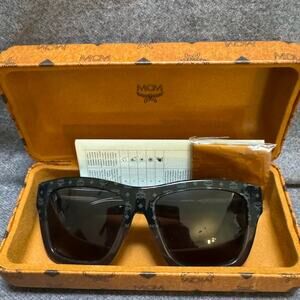 MCN SUNGLASSES New in box